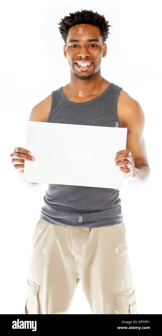 Belle afro-american man posing in a studio isolé sur un arrière-plan Banque D'Images