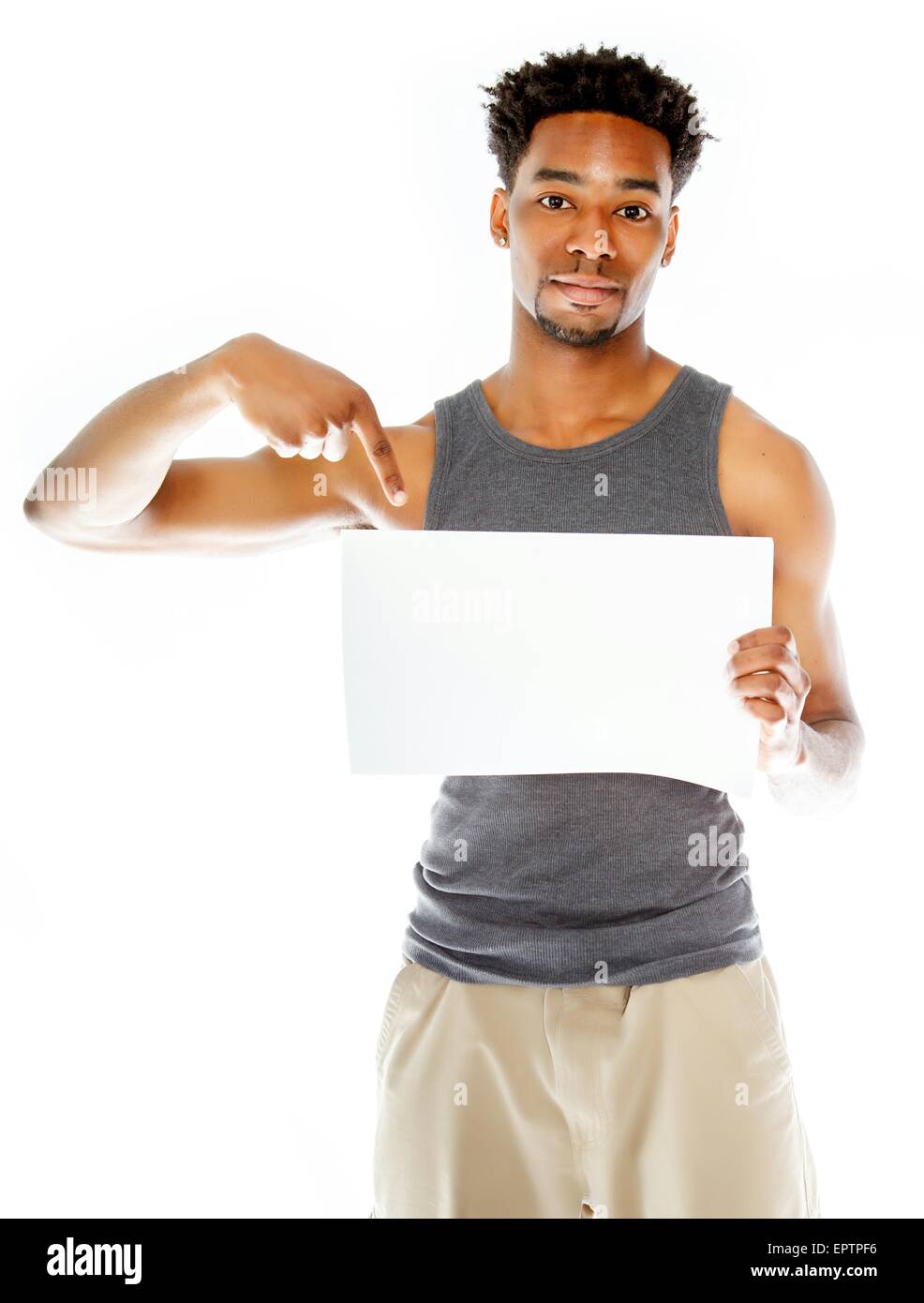 Belle afro-american man posing in a studio isolé sur un arrière-plan Banque D'Images
