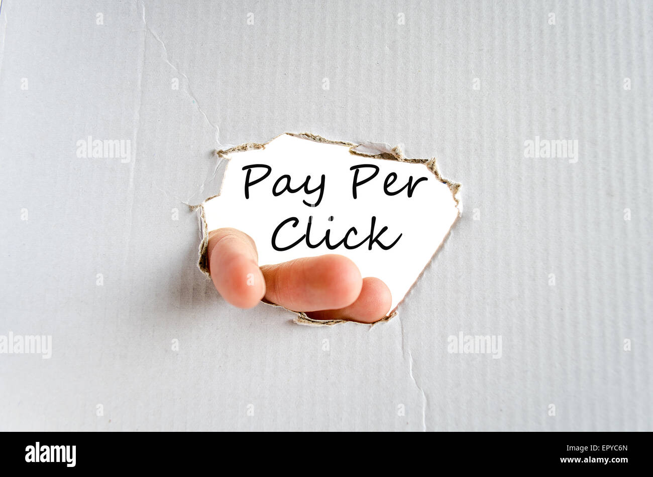 Et la main sur le texte de base en carton concept Paiement par clic Banque D'Images