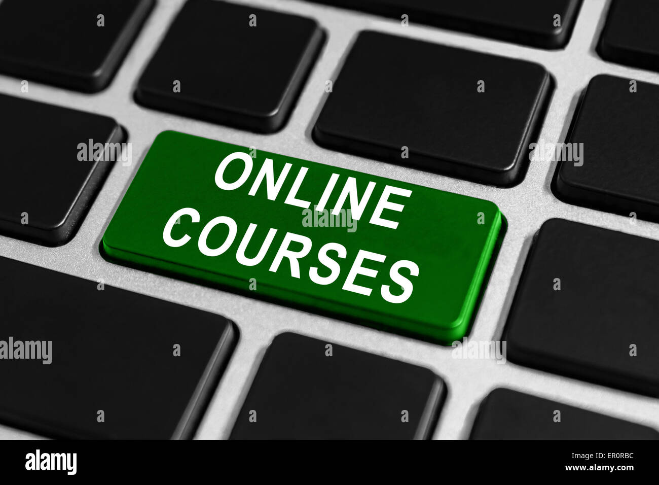 Cours en ligne bouton vert sur clavier Banque D'Images