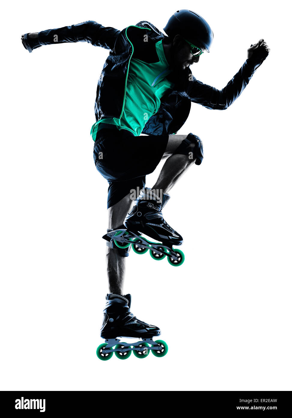 Un caucasian man roller inline Skater Roller en silhouette isolé sur fond blanc Banque D'Images