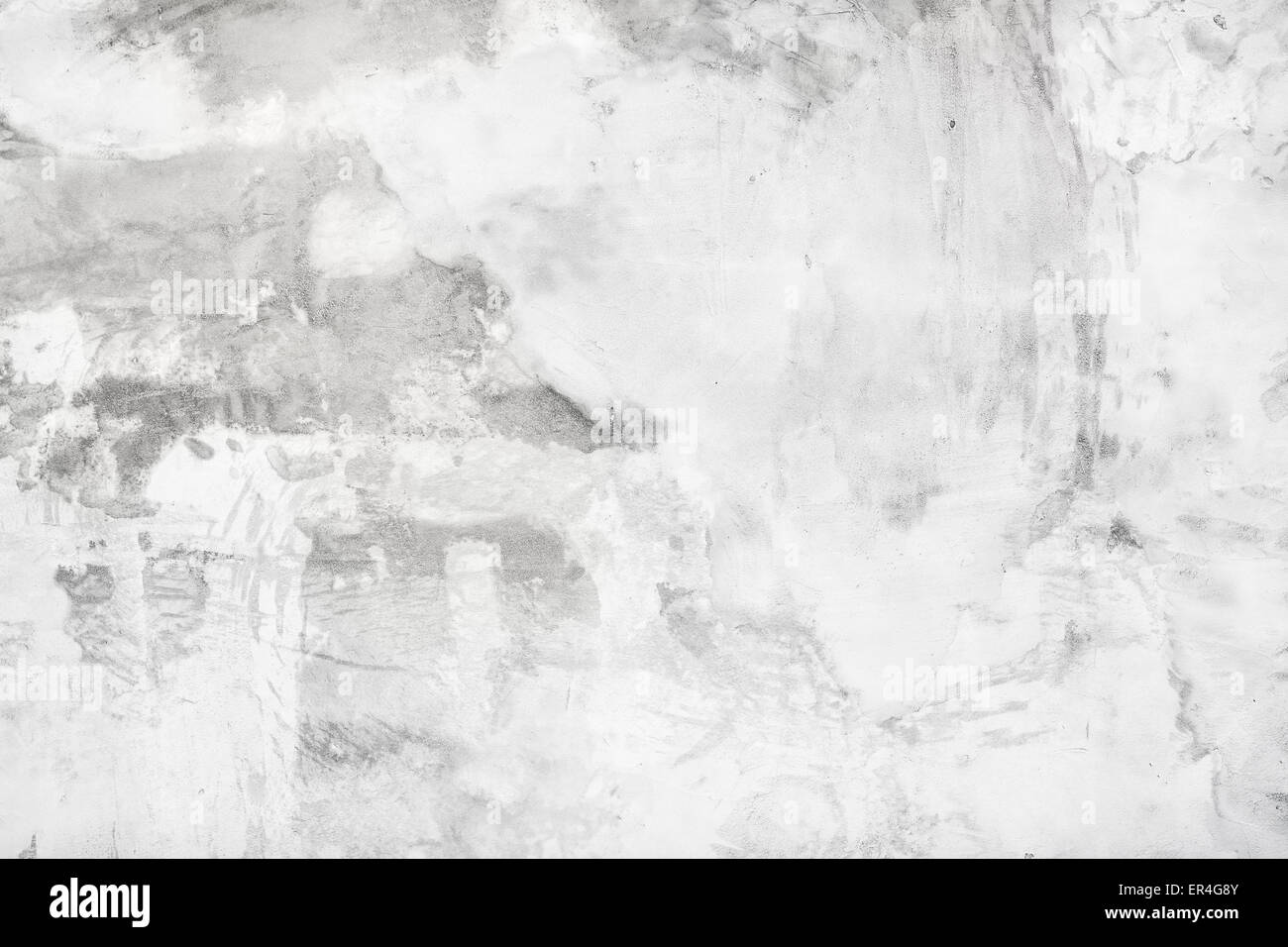 Mur de béton blanc Grungy avec du plâtre. Abstract grunge background. Banque D'Images