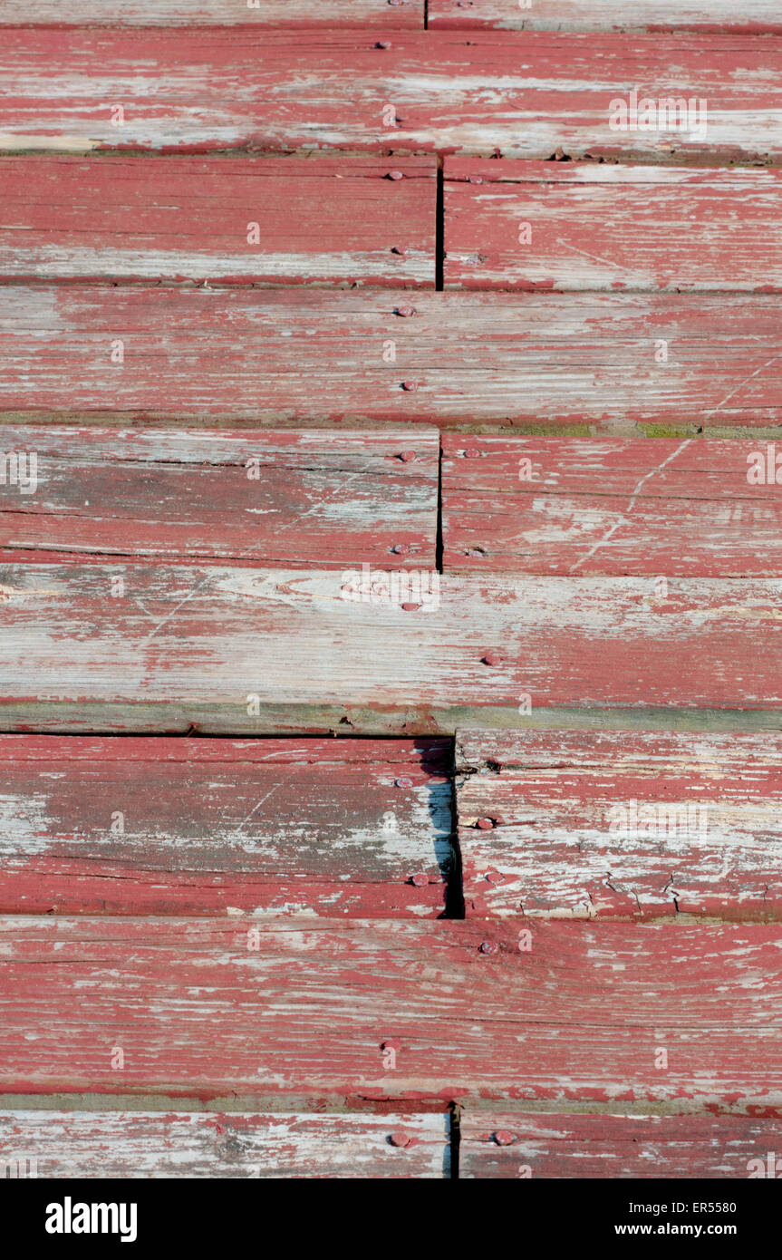 Vieux bois avec peinture rouge brique. Banque D'Images