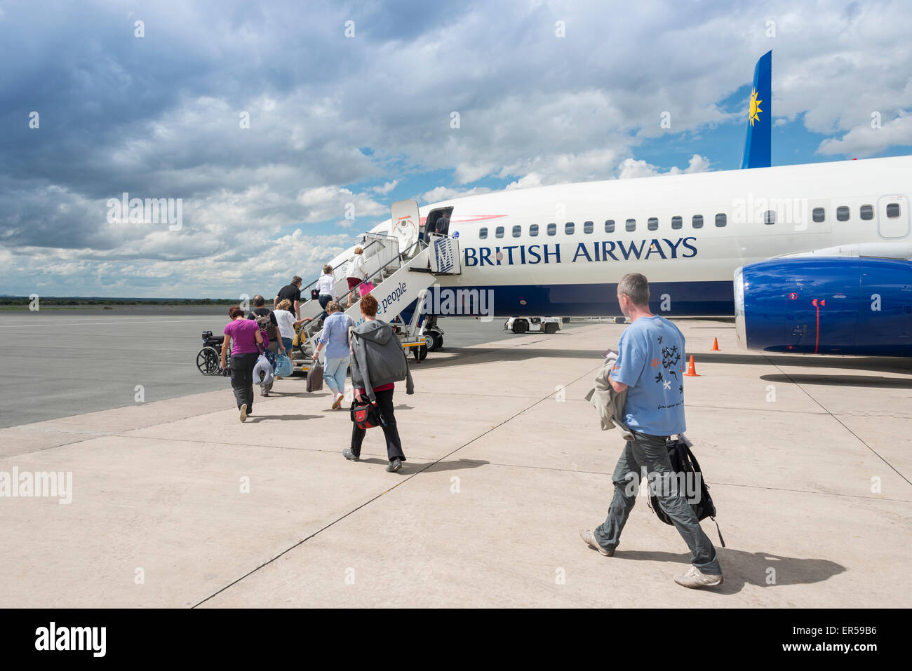 L'embarquement des passagers de British Airways (Comair) Boeing 737 à l'Aéroport International Hosea Kutako de Windhoek, Namibie, République de Banque D'Images