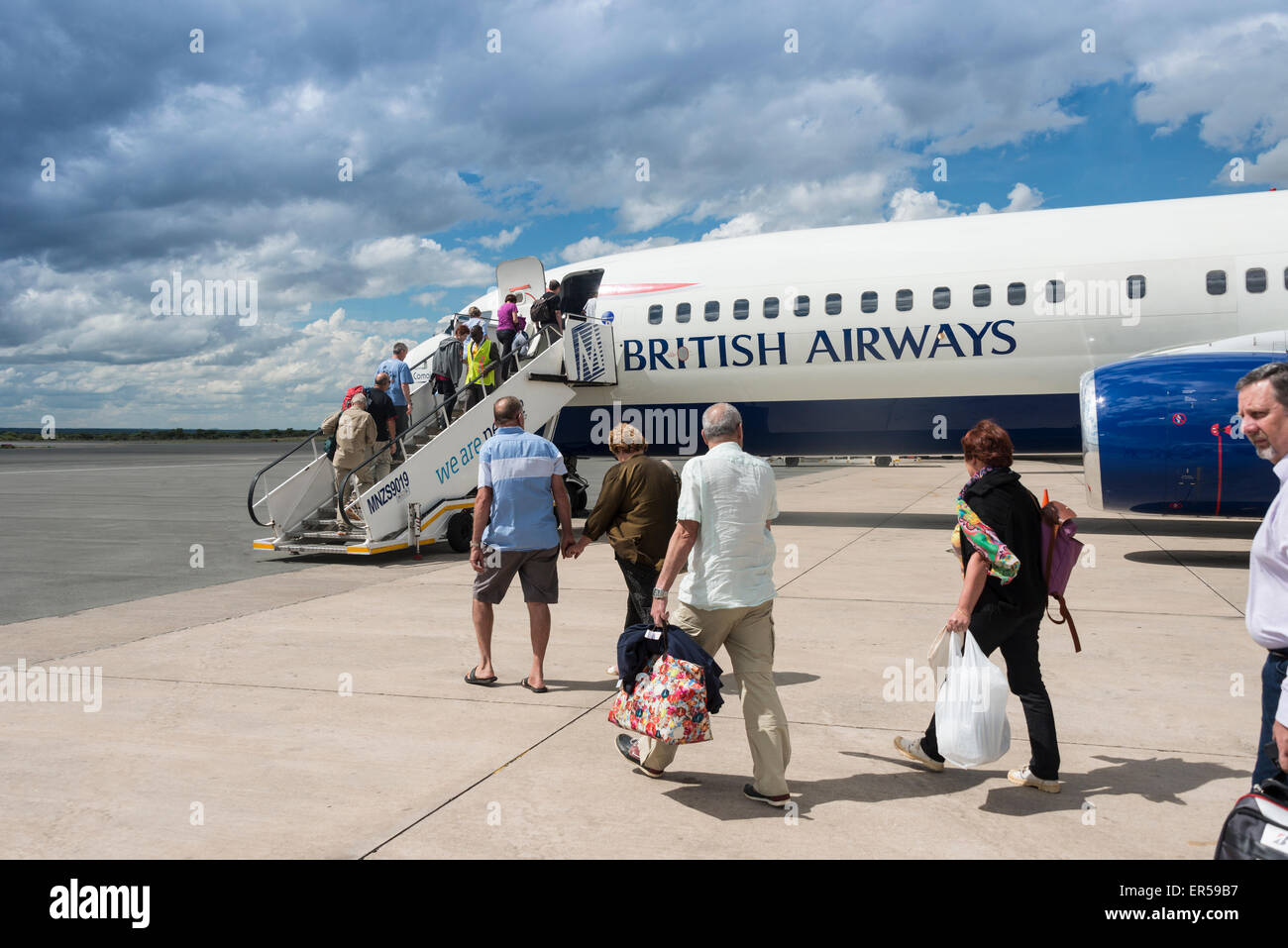 L'embarquement des passagers de British Airways (Comair) Boeing 737 à l'Aéroport International Hosea Kutako de Windhoek, Namibie, République de Banque D'Images