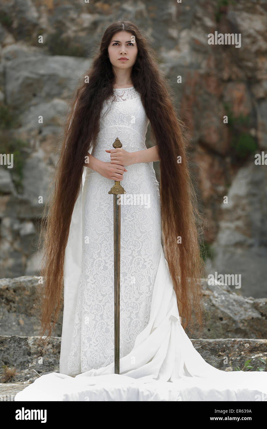 Réminiscence à Jeanne d'Arc, Jeanne d'Arc, jeune femme en robe blanche avec une épée Banque D'Images