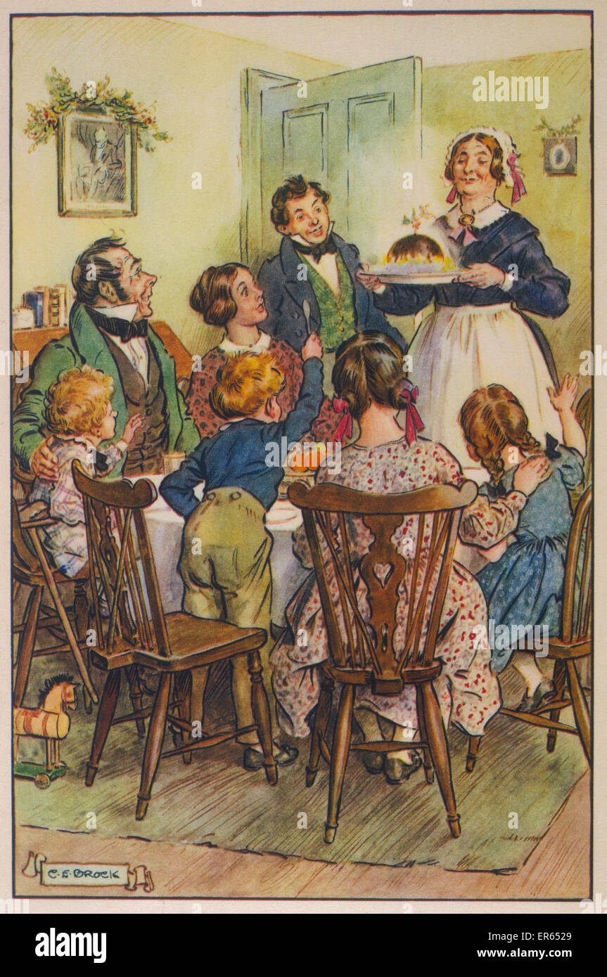 Pour le plus grand plaisir de sa grande famille, mama apporte dans le pudding de Noël. Banque D'Images