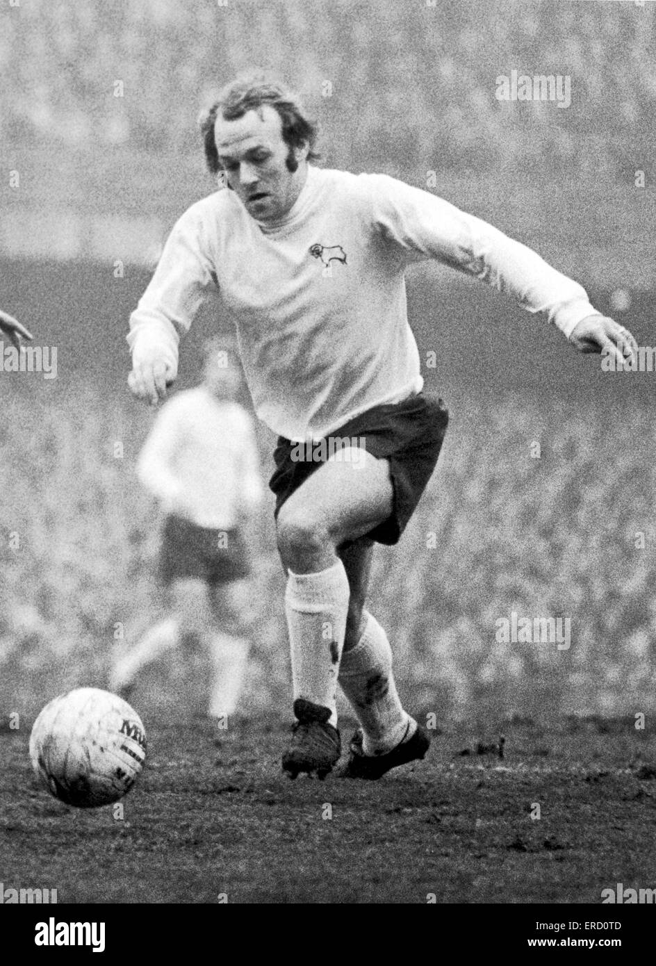 5e tour de la FA Cup Match au terrain de baseball. Derby County 2 v Arsenal 2. Archie Gemmill opn du Derby la balle. 22 janvier 1972. Banque D'Images