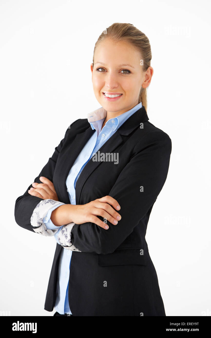 Studio Portrait Of Businesswoman Standing Against White Background Banque D'Images