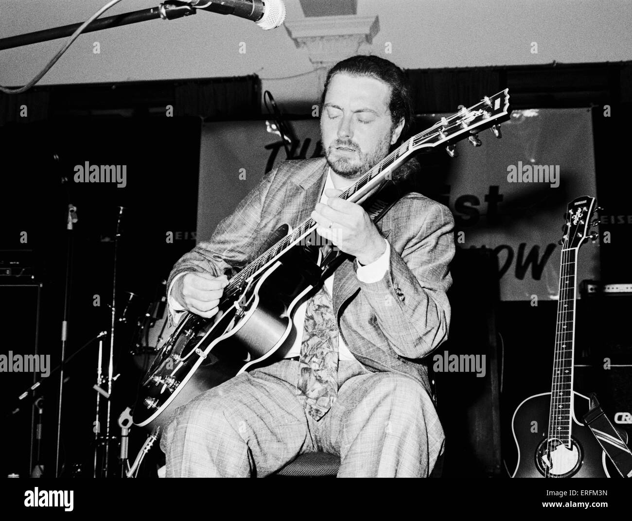 Martin Taylor - portrait de la guitariste de jazz britannique d'effectuer dans une classe de maître à Londres, 1991. b. 20 octobre 1956. Banque D'Images