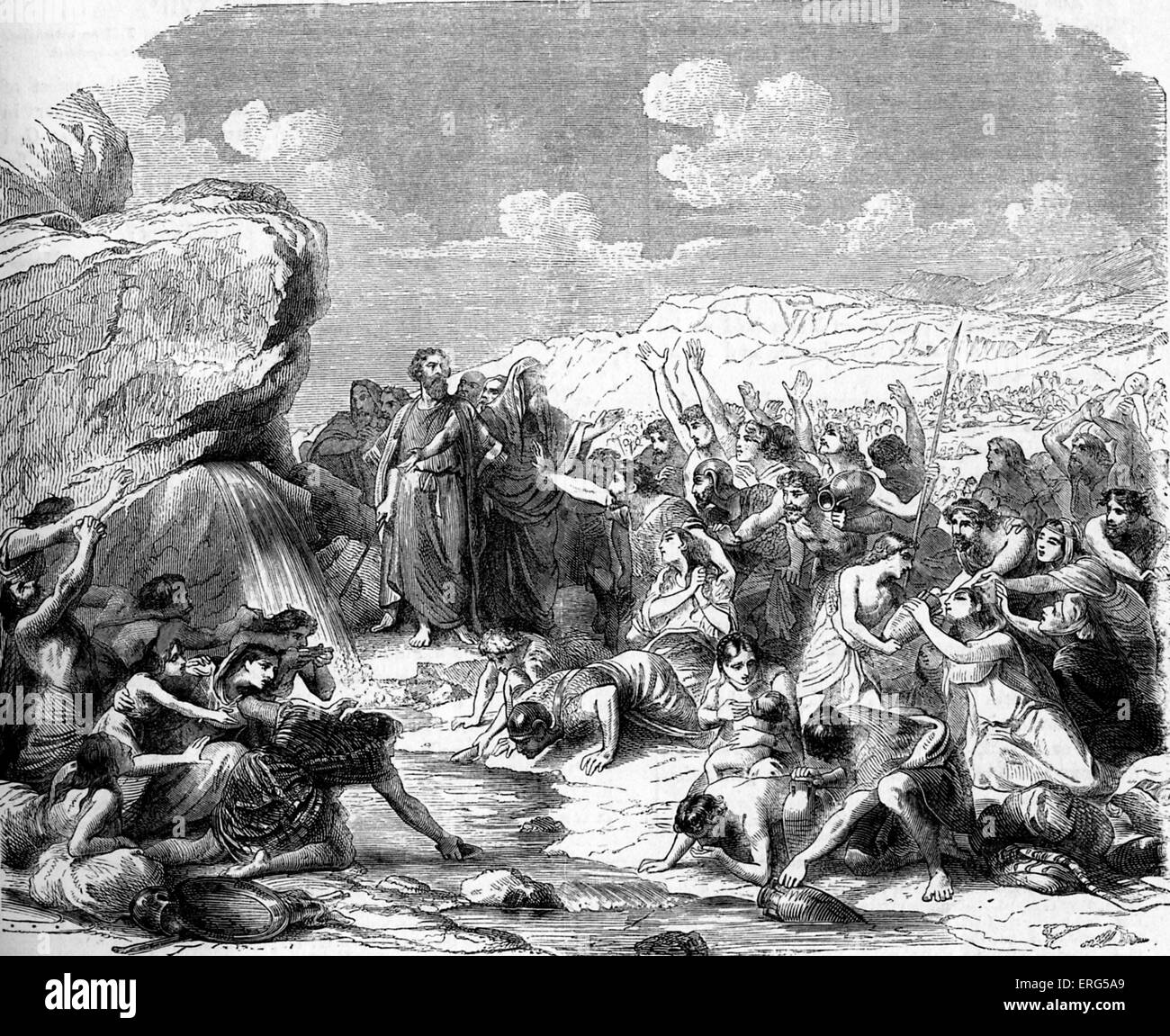 Moïse frappant le rocher pendant les errances de l'ex-esclaves hébreux dans le désert.. La Bible, Exode, XVII, verset 6 : ' Banque D'Images