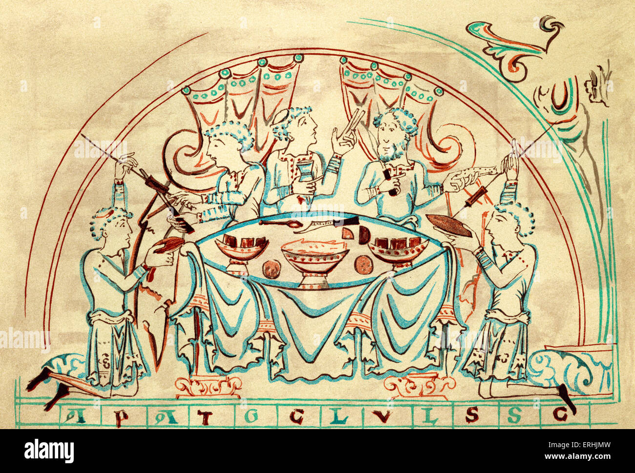 Un banquet. 11e siècle. Un groupe de personnes festoyant à une table. Banque D'Images