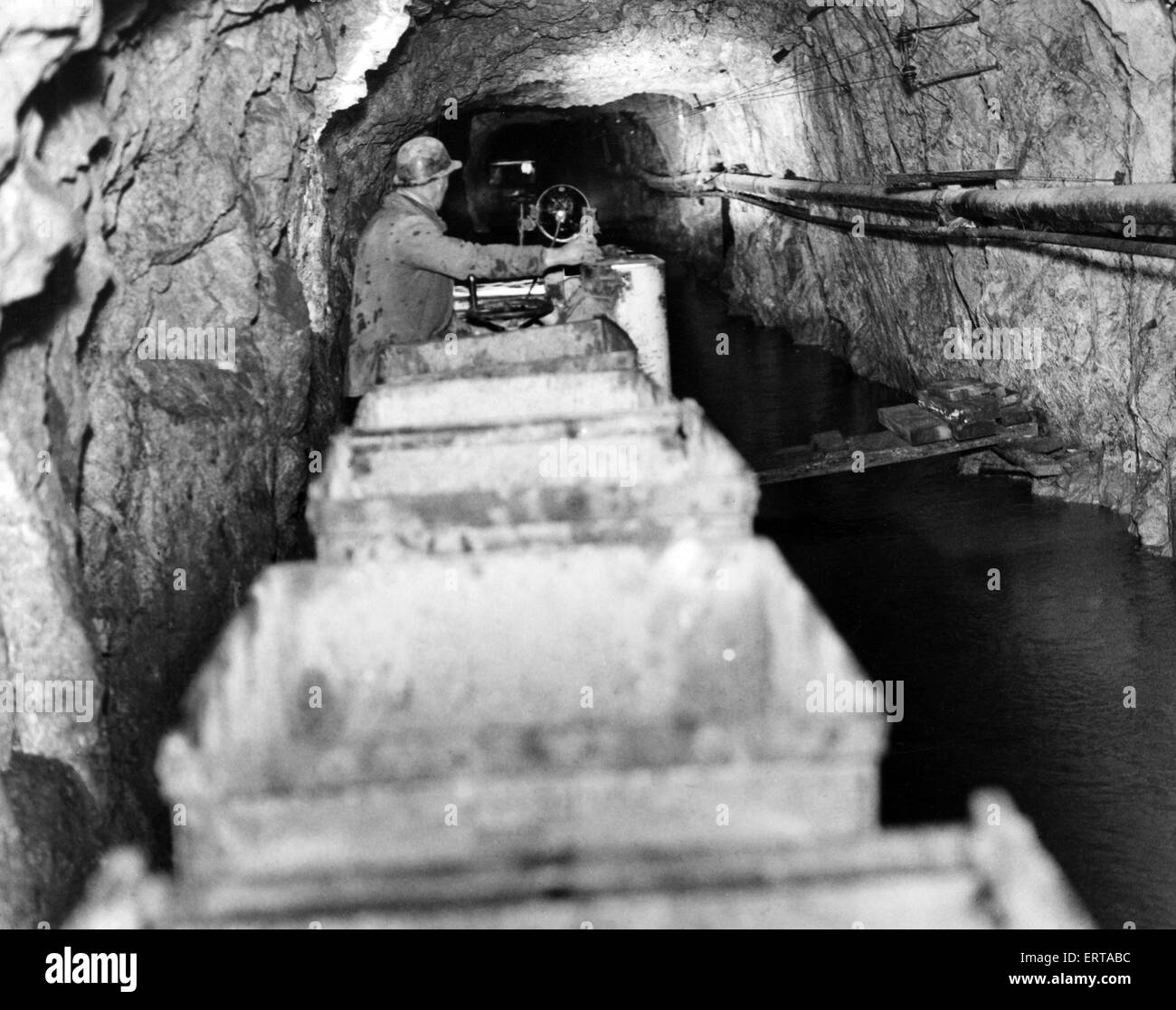 Mine de plomb, Rhydymwyn, près de moule, Flintshire, Pays de Galles, 5 mars 1938. La locomotive à piles, à l'inondation. Banque D'Images Mine de plomb, Rhydymwyn, près de moule, Flintshire, Pays de Galles, 5 mars 1938. La locomotive à piles, à l'inondation. Banque D'Images