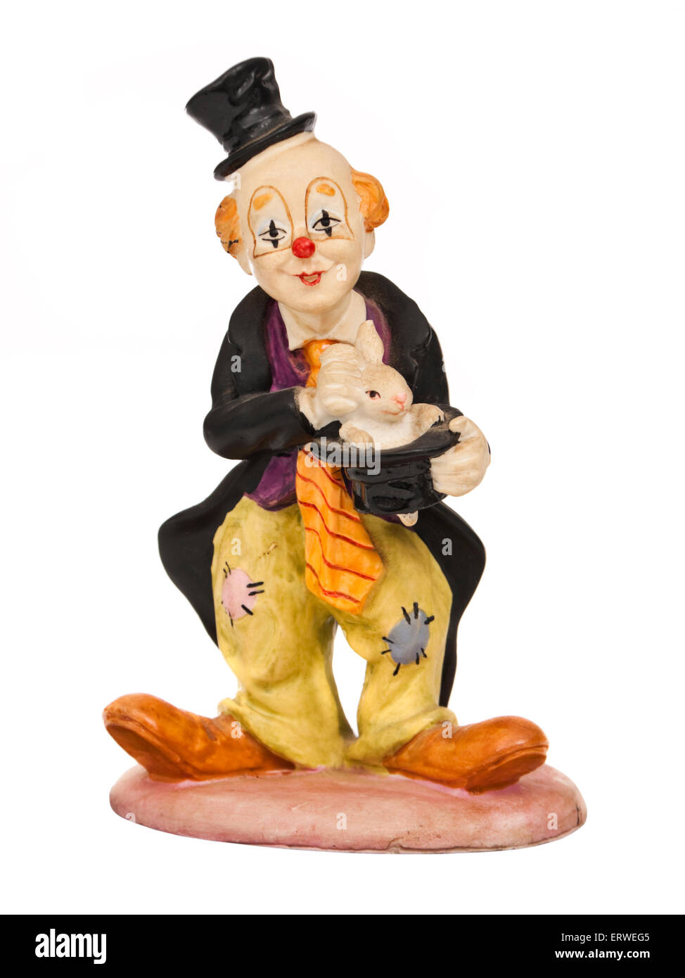 Figurine peinte à la main de Léonard, un clown de cirque de tirer un lapin d'un chapeau Banque D'Images
