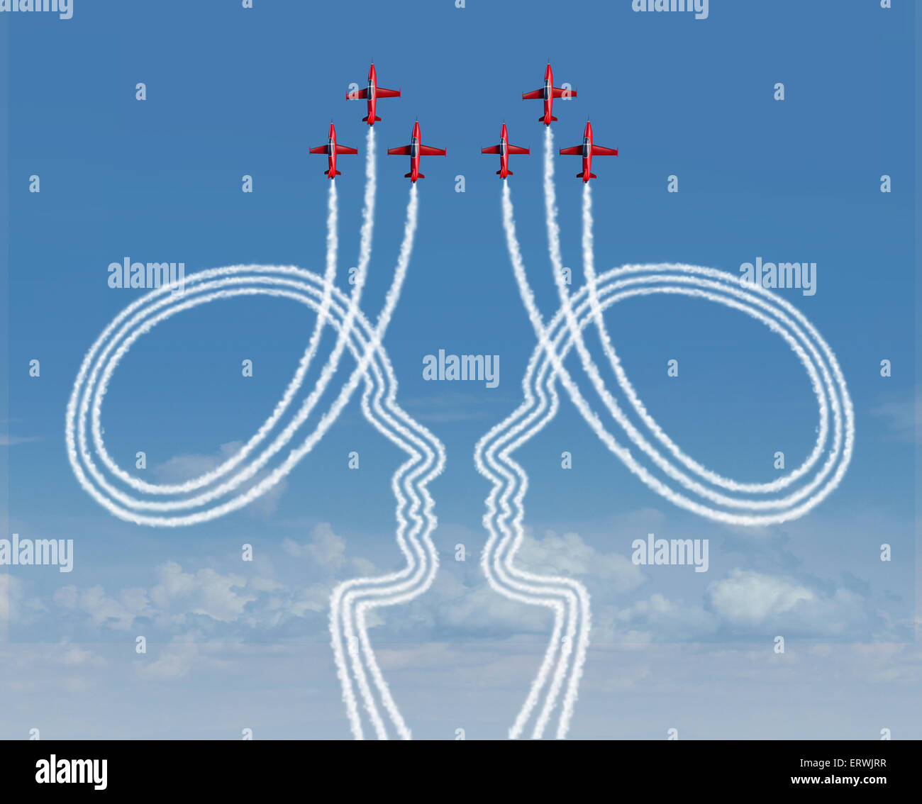 Concept de gestion d'équipe comme un groupe d'avions acrobatiques en forme de fumée créer comme deux personnes travaillant ensemble en partenariat pour la réussite d'organisation coordonnée pour le succès. Banque D'Images