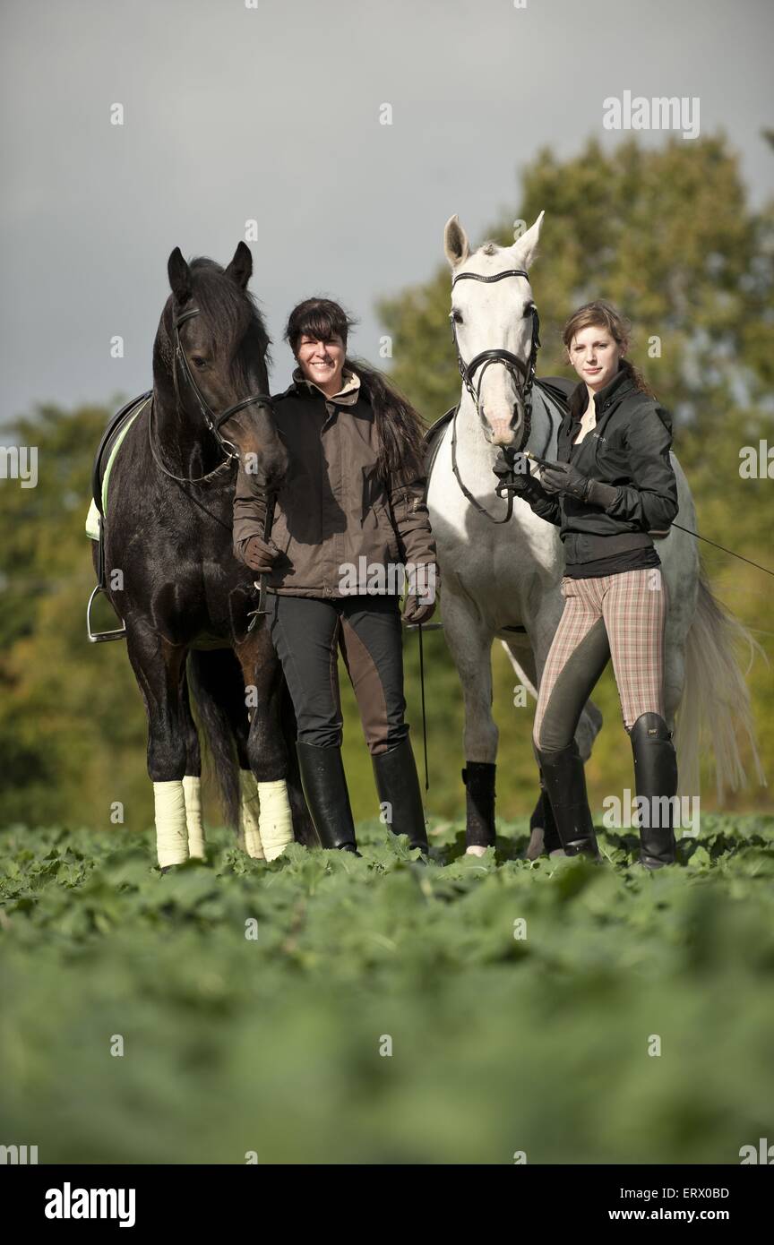 Les femmes avec les chevaux Banque D'Images