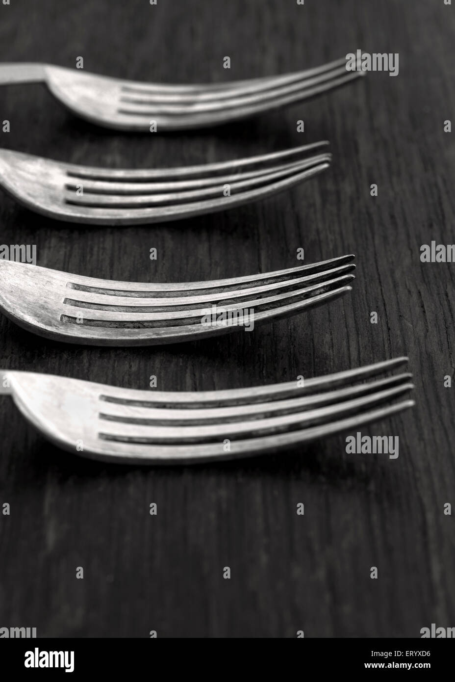 Four Old Vintage Dining Forks Banque D'Images