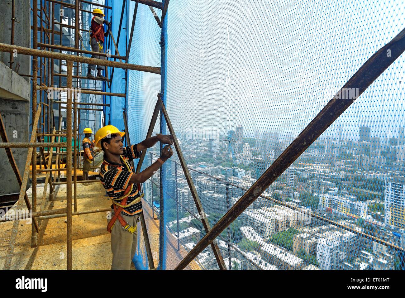 Les travailleurs qui travaillent dans la construction de l'aire centrale ; mumbai Bombay Mumbai Maharashtra Inde NOMR ; ; Banque D'Images