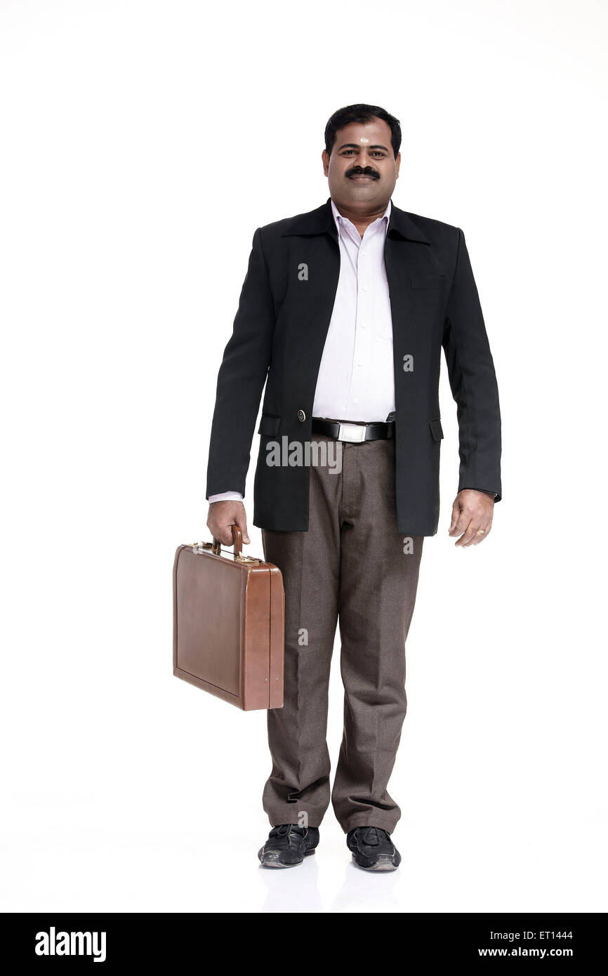 Businessman Holding Briefcase Inde Asie M.# 790E Banque D'Images