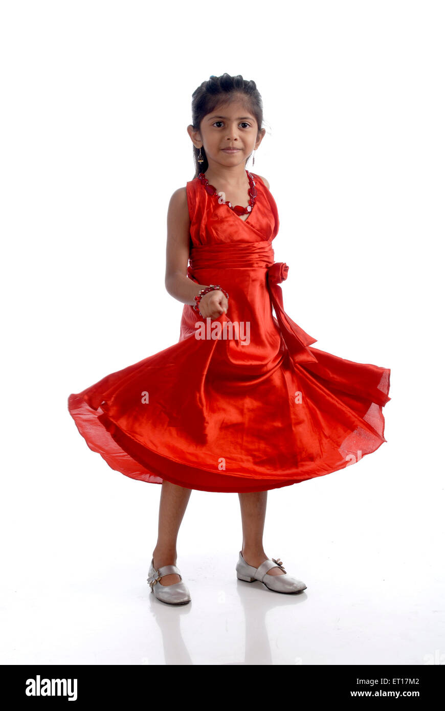 Girl wearing red dress et posing in front of camera ; Bombay Mumbai Maharashtra ; Inde ; M.# 736M Banque D'Images