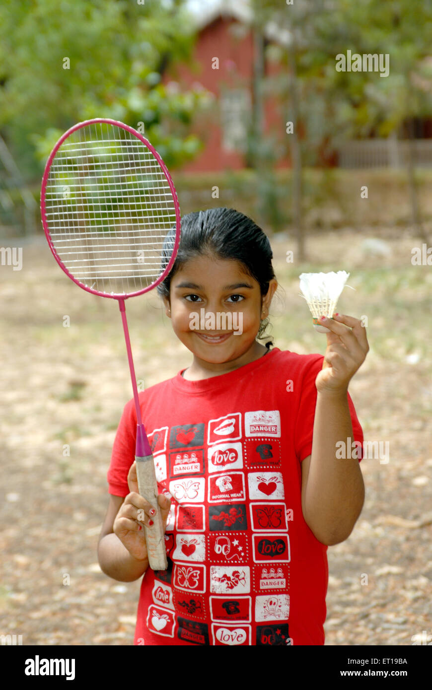 Jeune fille indienne avec raquette de badminton et de l'Inde M.# 152 navette Banque D'Images