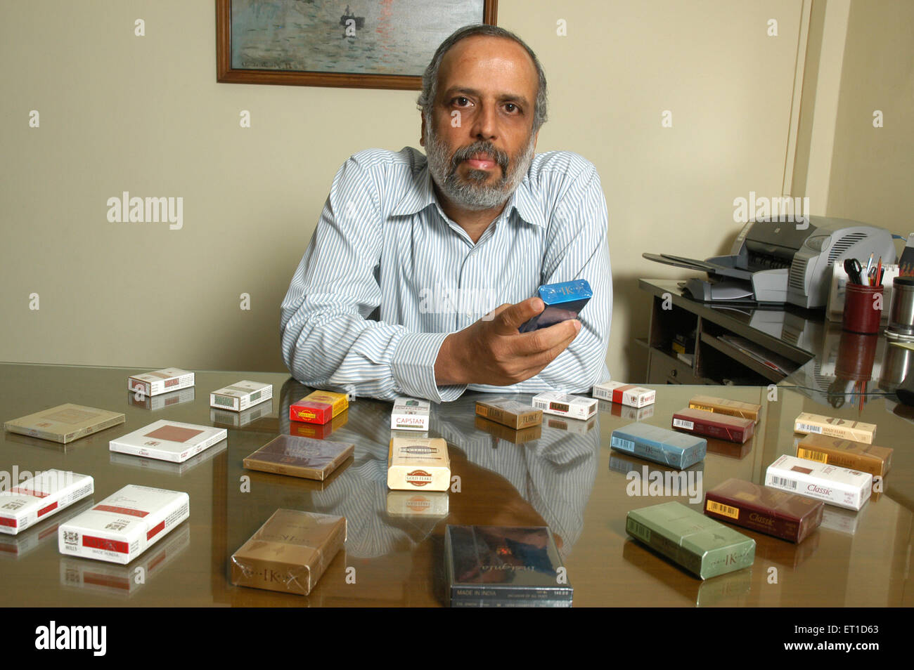 T. C. Ramaswamy de ITC limited company avec des marques de cigarettes