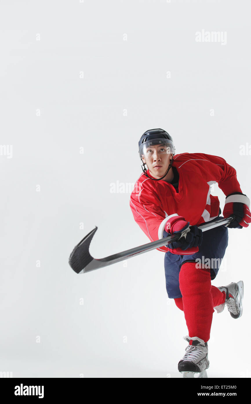 Jeune joueur de hockey sur glace masculin Banque D'Images