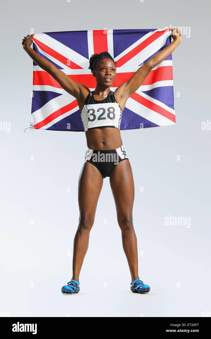 Athlète féminin tenant un drapeau britannique Banque D'Images