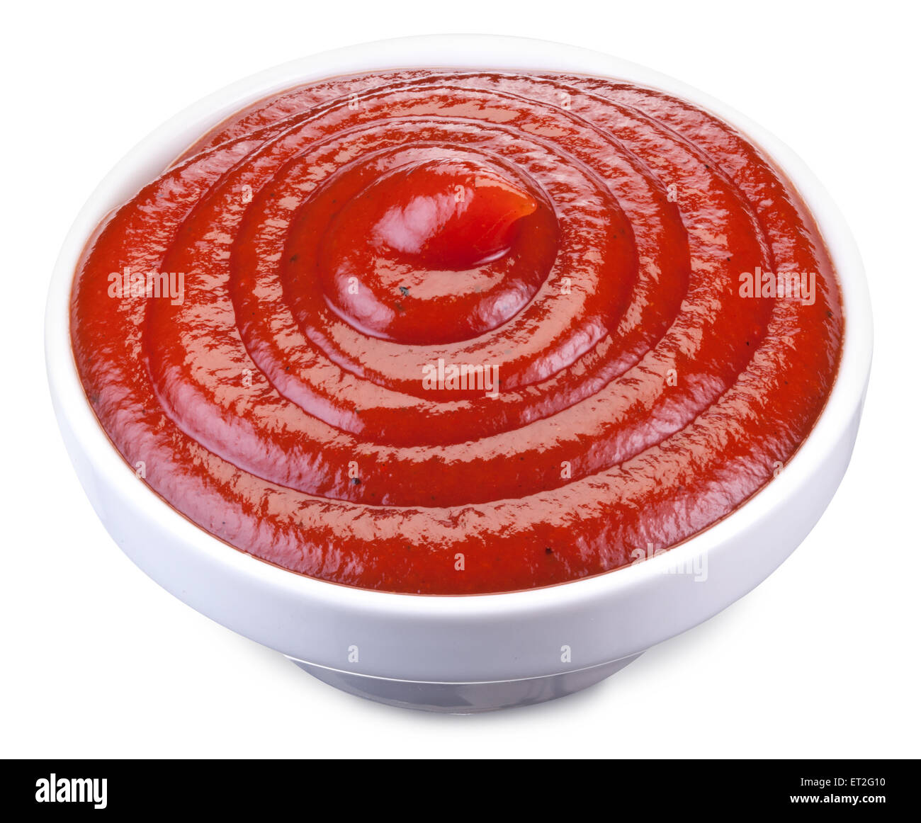 Le ketchup dans le petit bol. Fichier contient des chemins de détourage. Banque D'Images