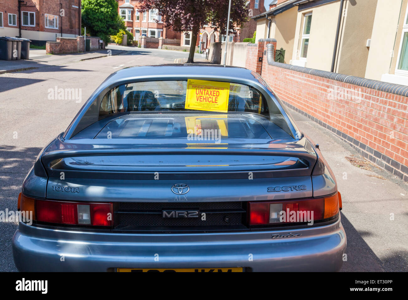 Voiture sans taxe. Véhicule non taxés avis sur le dos d'une voiture en raison de la taxe impayée, Lancashire, England, UK Banque D'Images