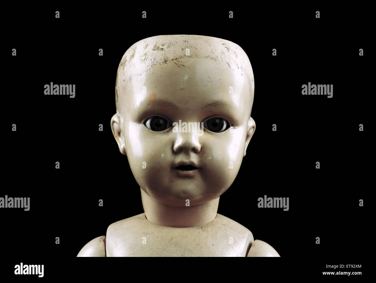 Vintage doll face isolated on black with clipping path Banque D'Images