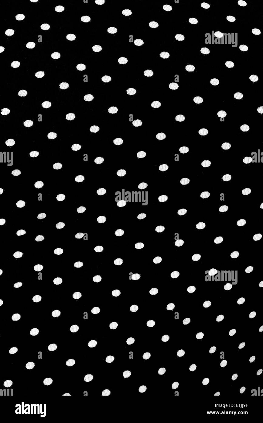 Modèle composé de points blancs sur fond noir Banque D'Images