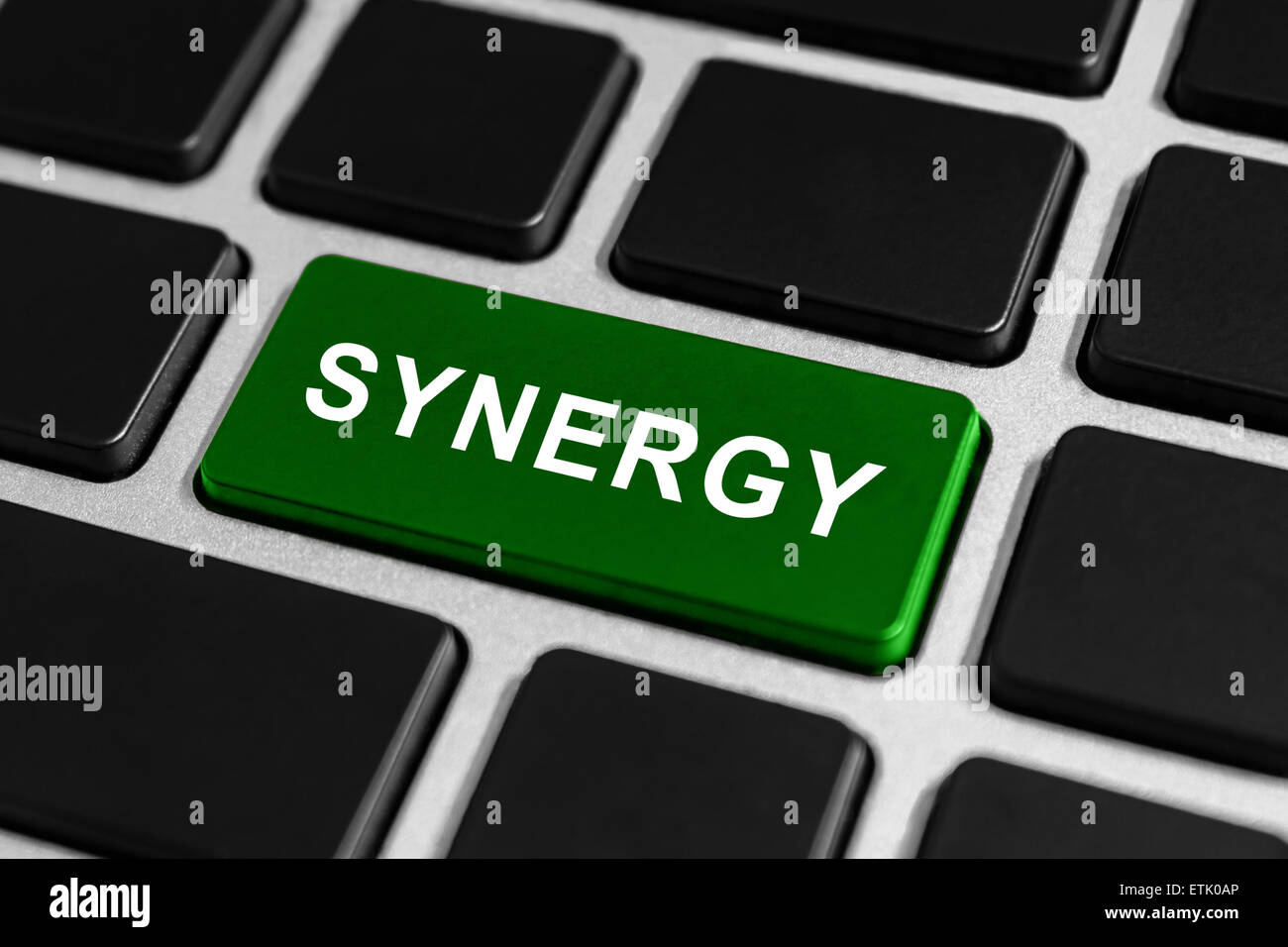 Synergie touche verte de clavier, concept d'entreprise Banque D'Images