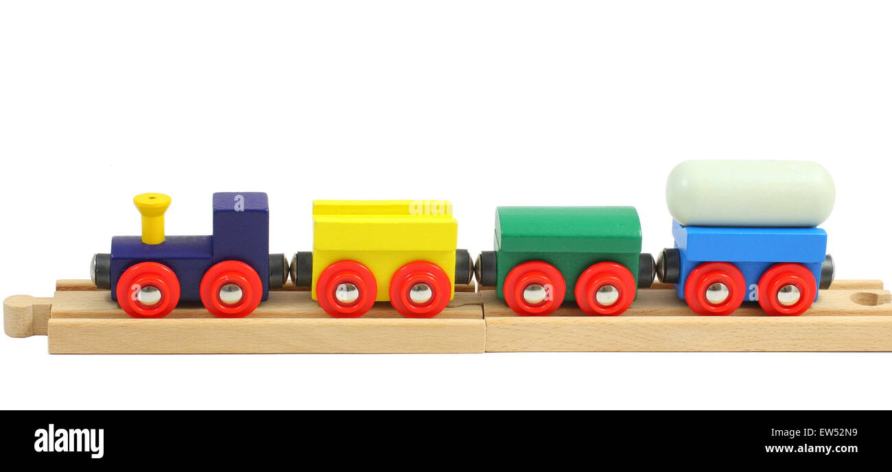 Train en bois jouet sur rails isolated on white Photo Stock - Alamy
