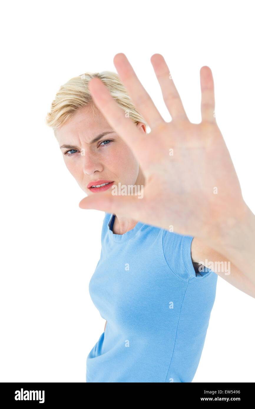 Stern woman gesturing with her hand Banque D'Images