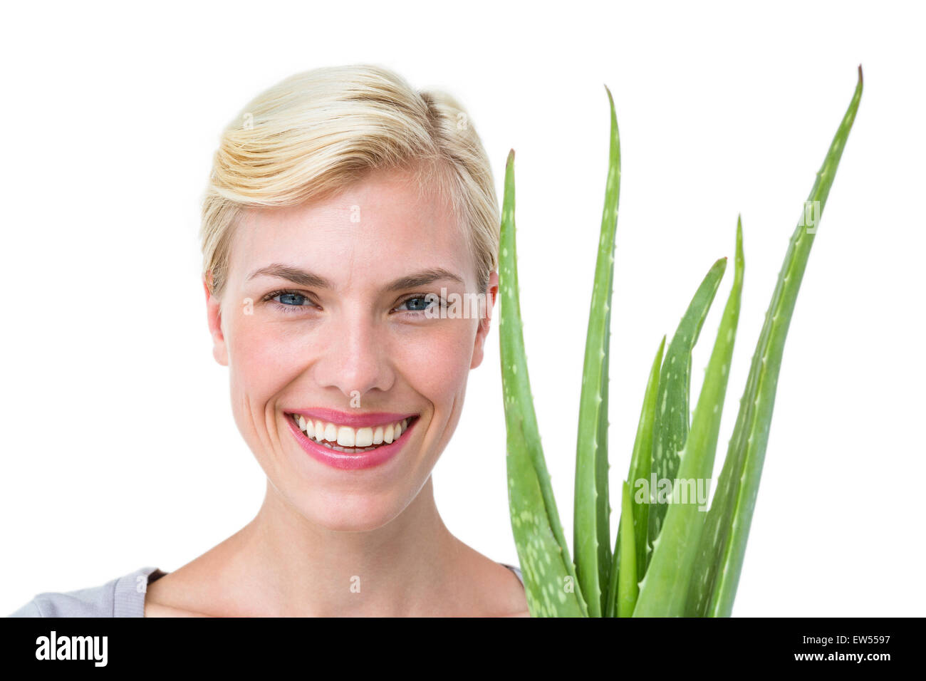 Attractive Woman holding aloe vera Banque D'Images