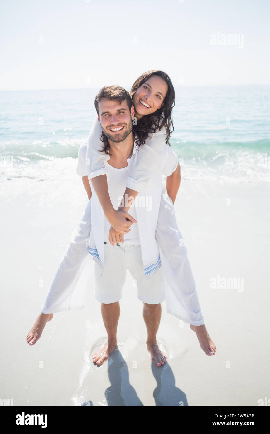 Bel homme faire à profit pour sa petite amie Banque D'Images