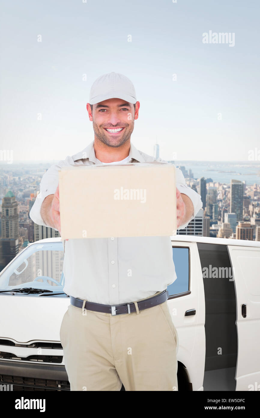 Image composite de portrait of delivery man giving package Banque D'Images