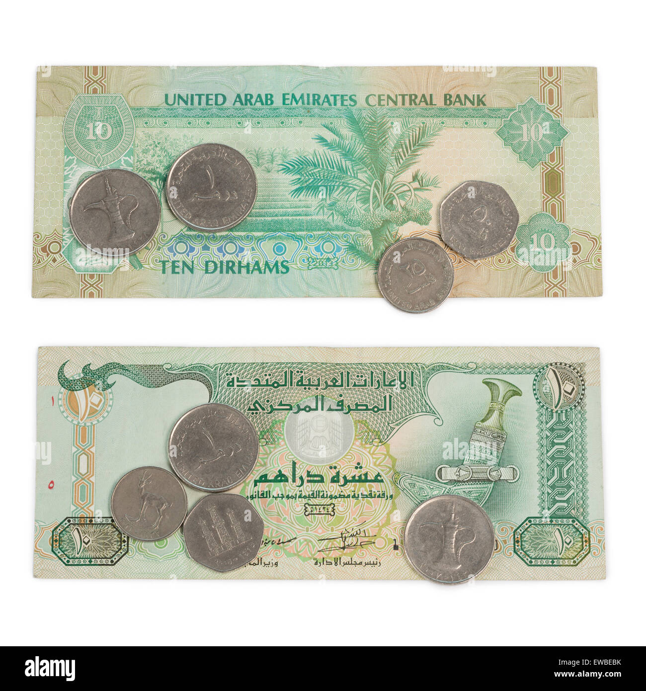 Dix Dirhams Note et coins, Currency des Émirats arabes unis sur la table en bois Banque D'Images
