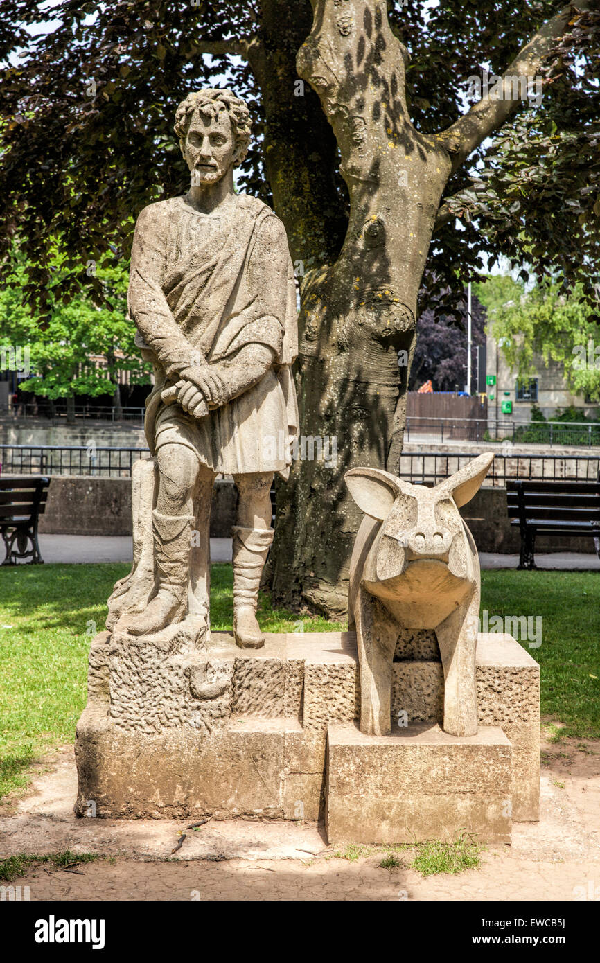 L'homme et un cochon Sculpté en pierre de Bath dans le parc dans le centre de Bath. Banque D'Images