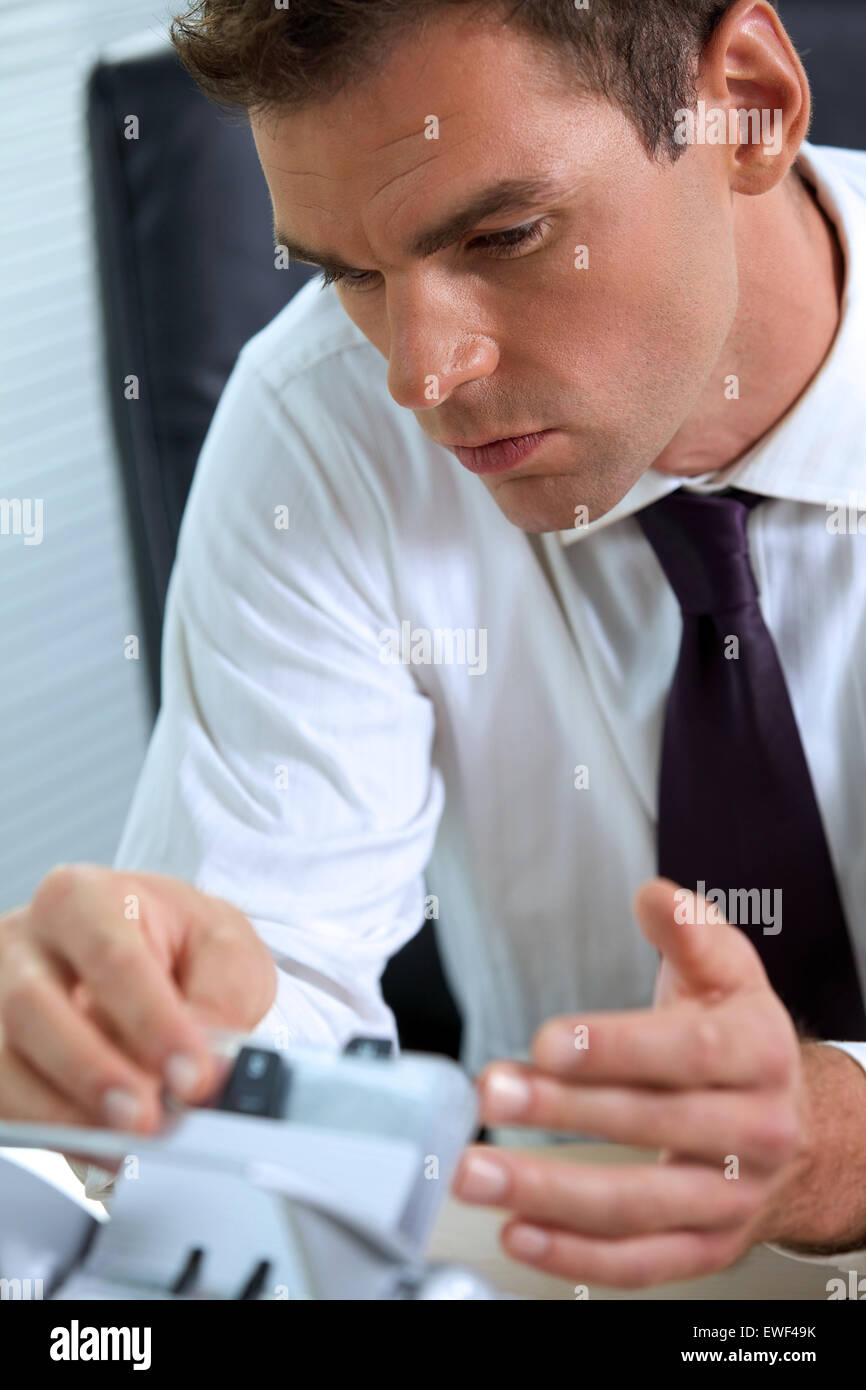 Businessman at work in office Banque D'Images