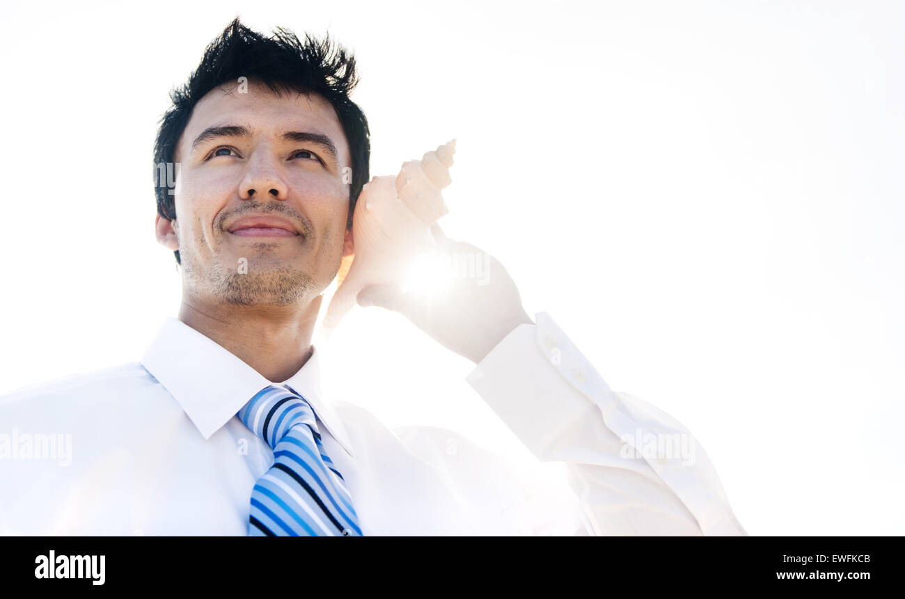 Businessman with Shell. Banque D'Images