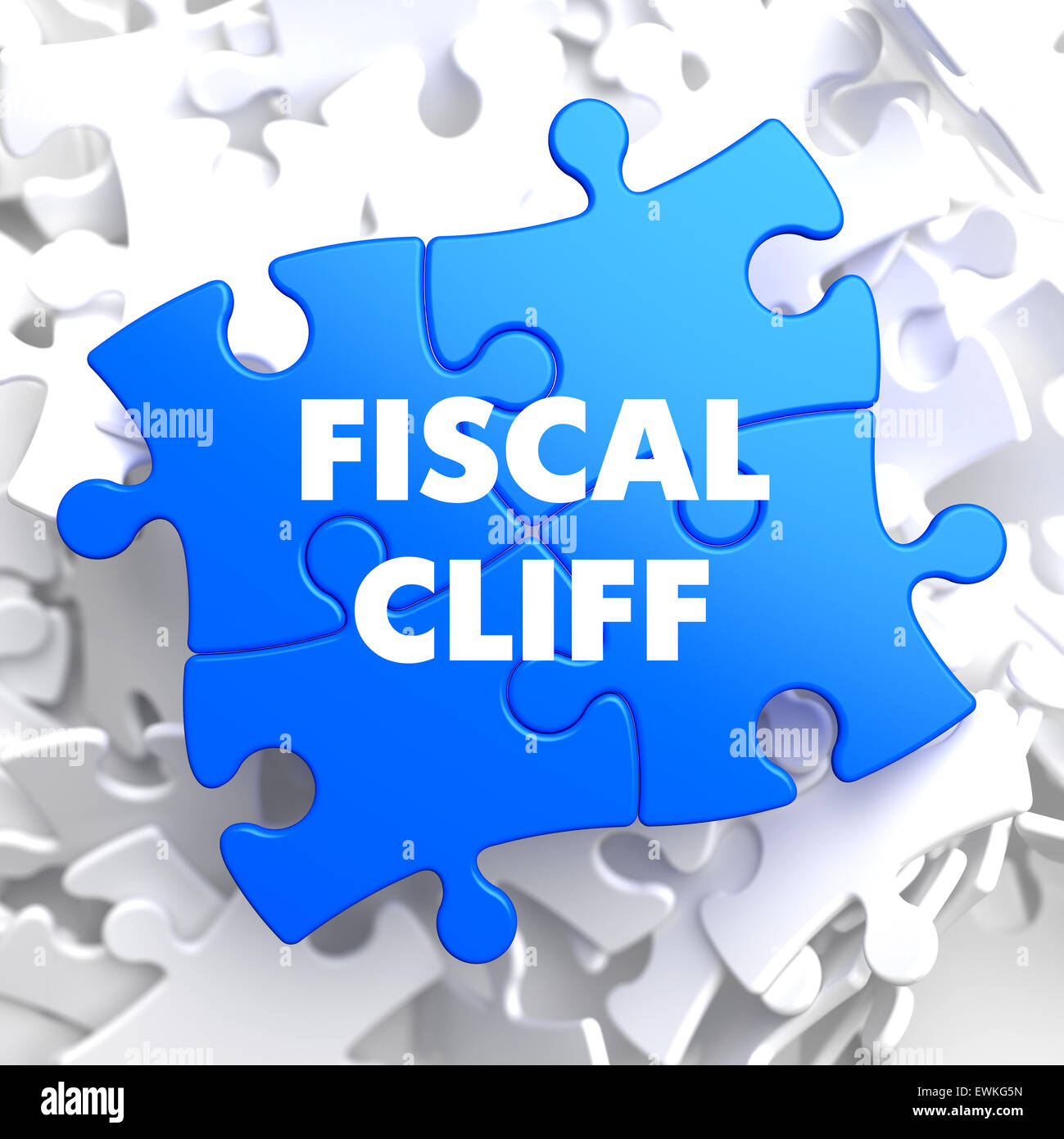 Fiscal Cliff sur Puzzle bleu. Banque D'Images