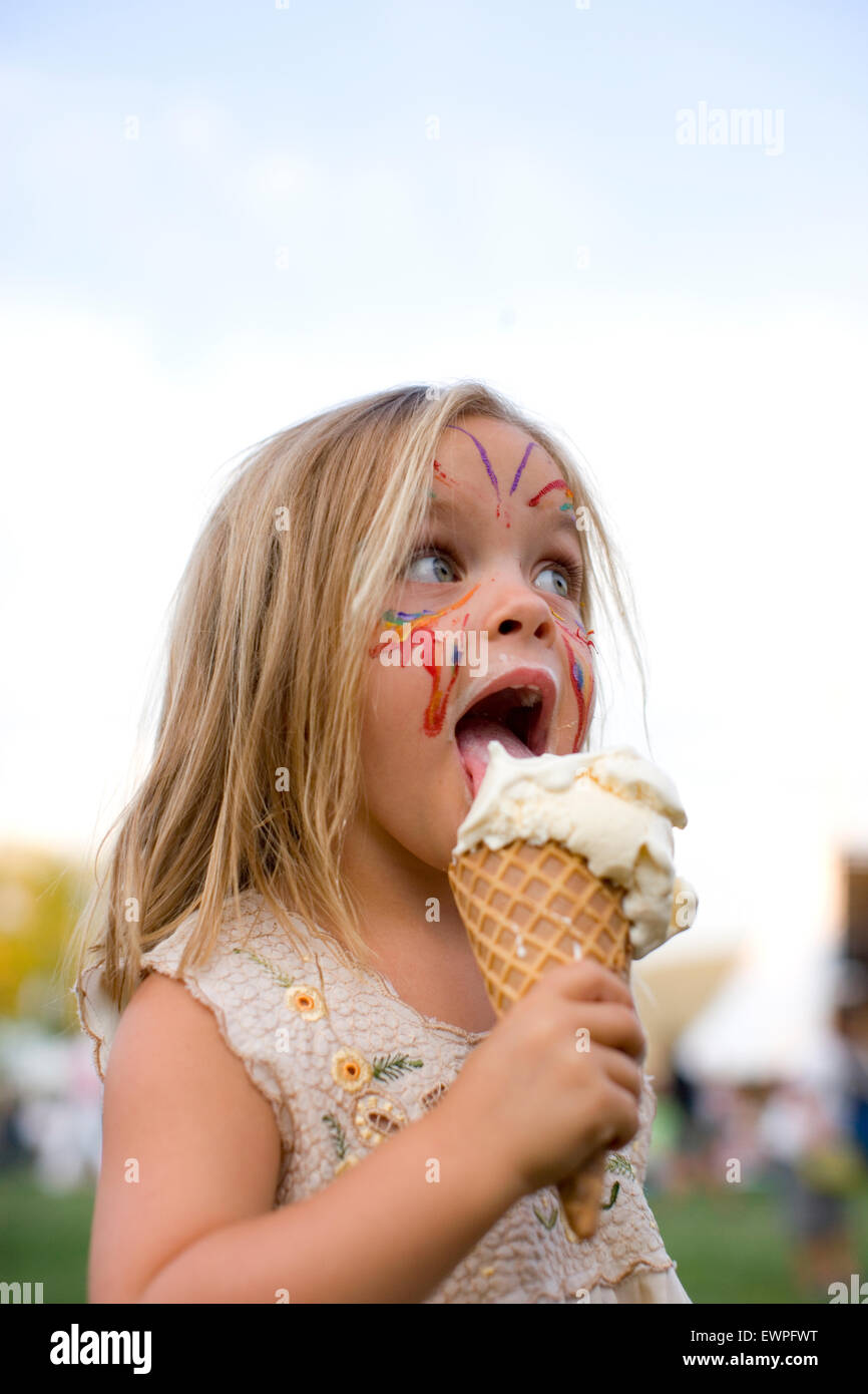 Little girl licking ice cream cone Photo Stock Alamy