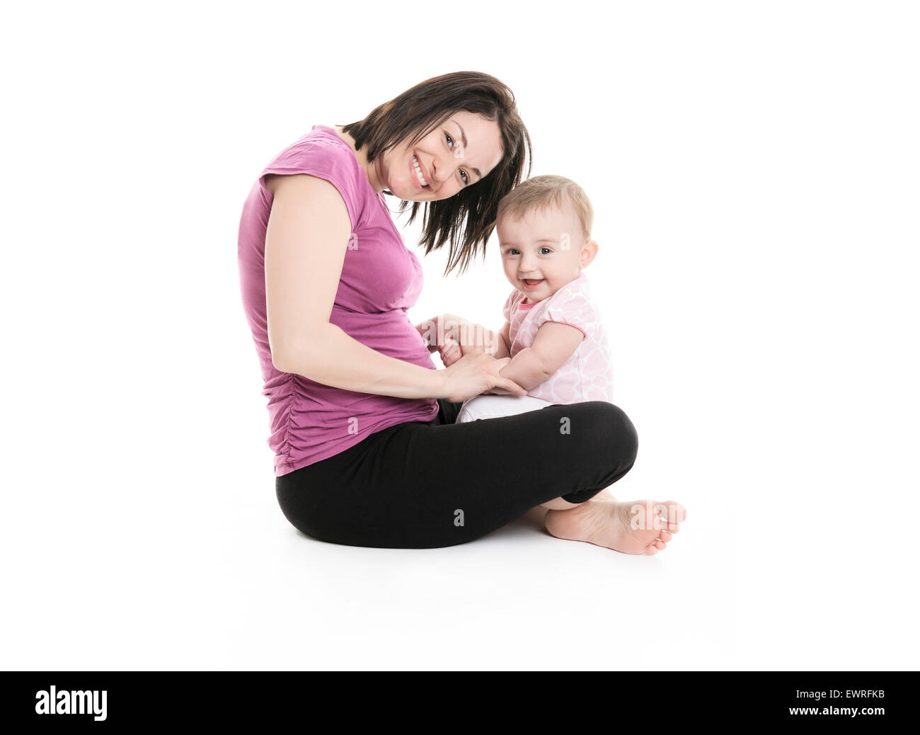Studio Portrait de Mère avec jeune bébé fille Banque D'Images