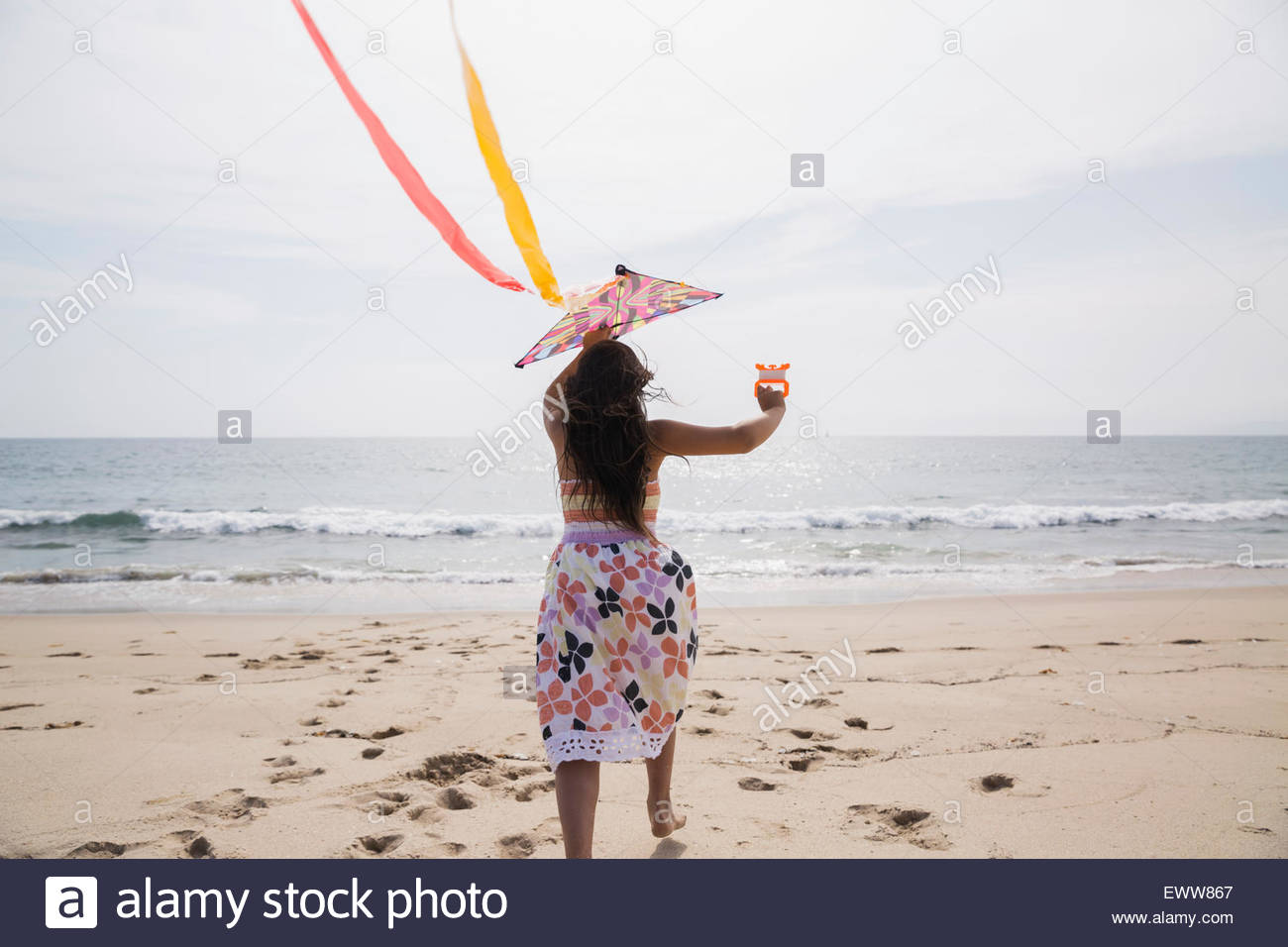 Habiller sur la plage Banque de photographies et d’images à haute