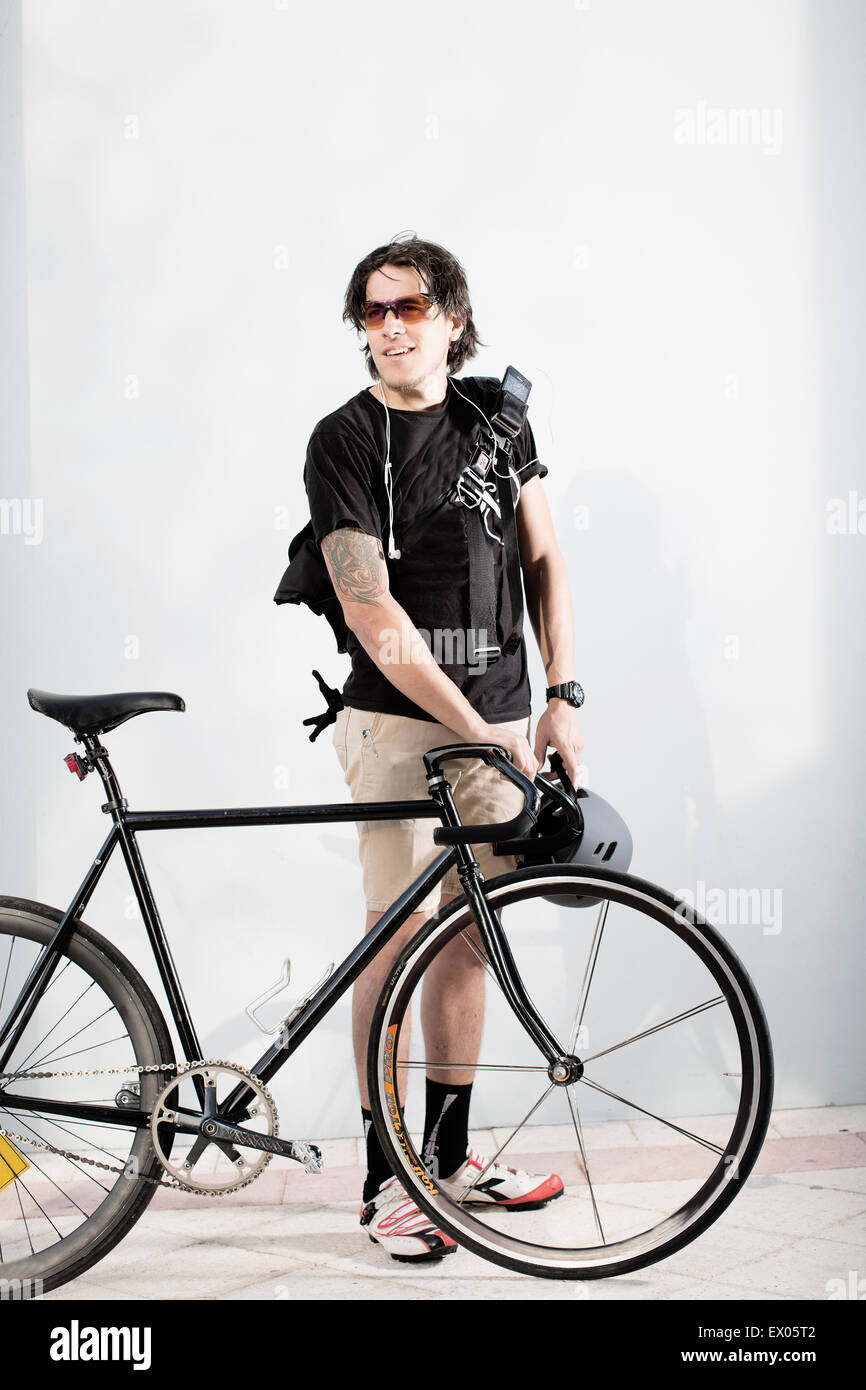 Bike messenger avec le vélo Banque D'Images