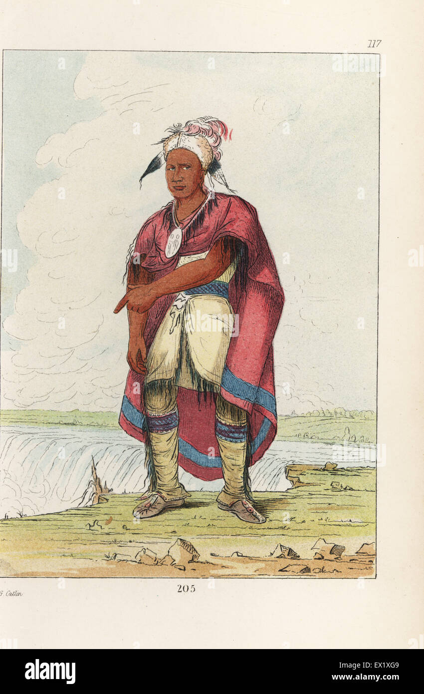 Chef seneca veste rouge debout sur la Table Rock à Niagara Falls. Lithographie coloriée de George Catlin's Manners, les douanes et l'état des Indiens d'Amérique du Nord, Londres, 1841. Banque D'Images