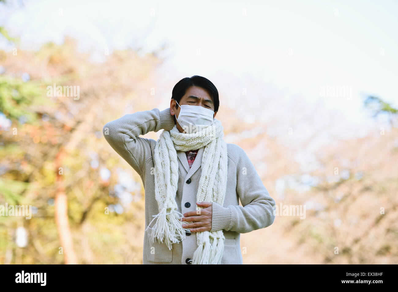 Hauts homme japonais avec masque malade de sentiment Banque D'Images