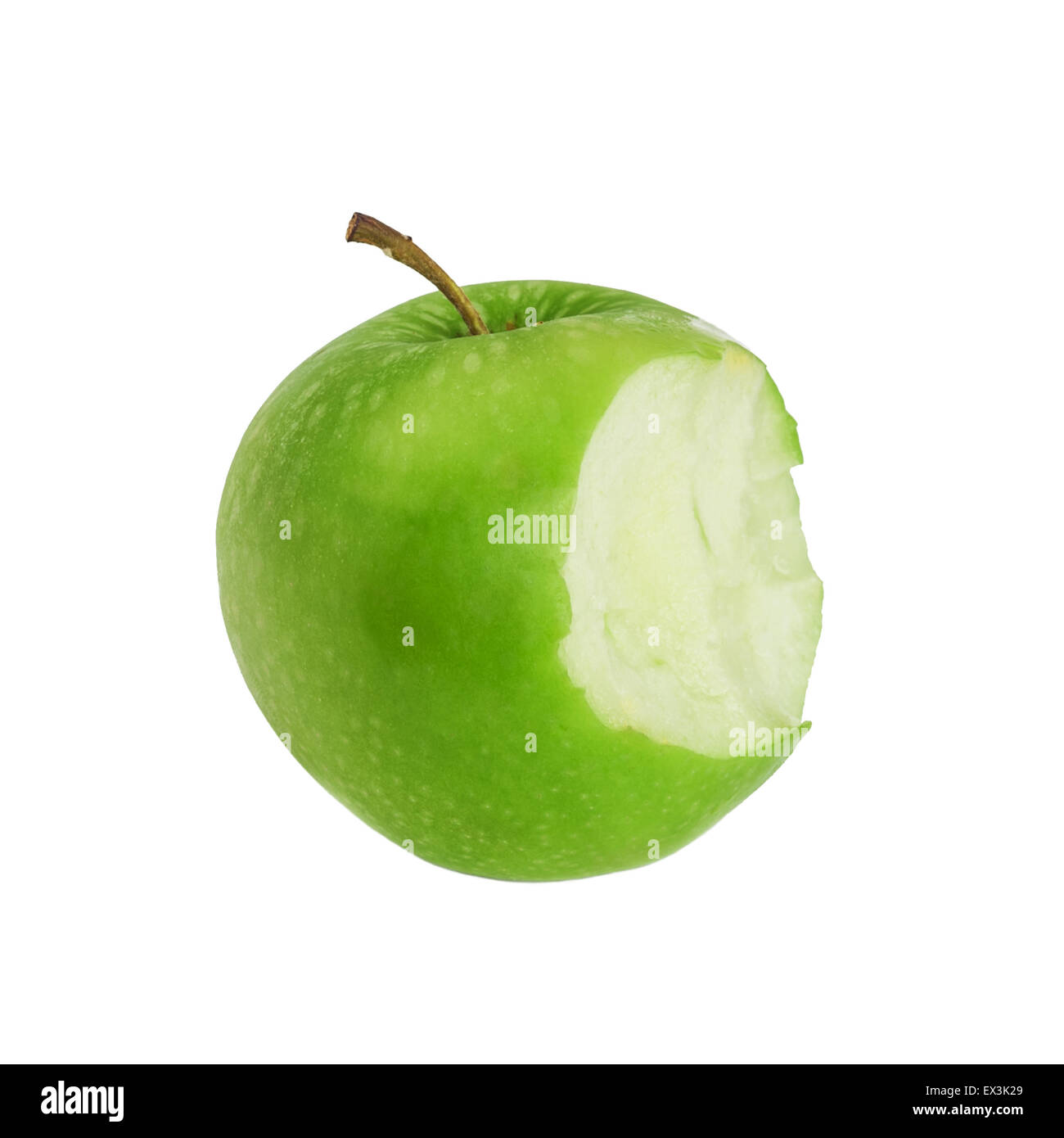 Bouchée de pomme verte, isolé sur fond blanc Banque D'Images